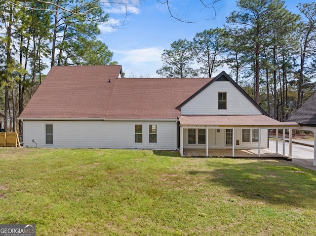 9 Wimbledon Ct, Statesboro, GA 30458 - rear view of property with a carport, a lawn, and a shingled roof