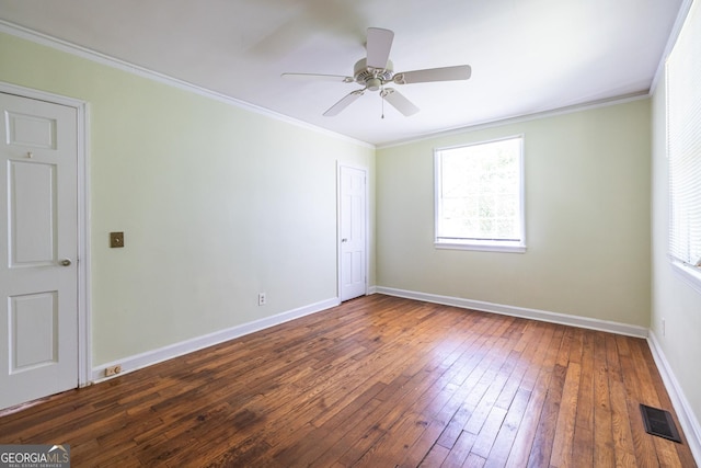 1268 Thomas Rd, Decatur, GA 30030 - empty room featuring plenty of natural light, hardwood / wood-style flooring, baseboards, crown molding, and a ceiling fan
