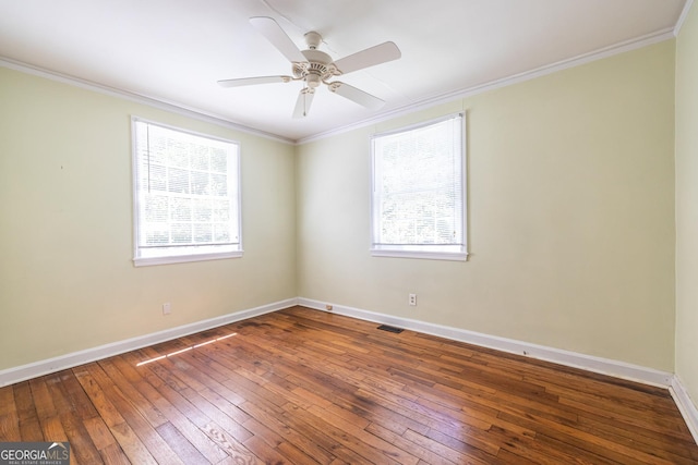 1268 Thomas Rd, Decatur, GA 30030 - empty room with plenty of natural light, hardwood / wood-style floors, baseboards, and crown molding