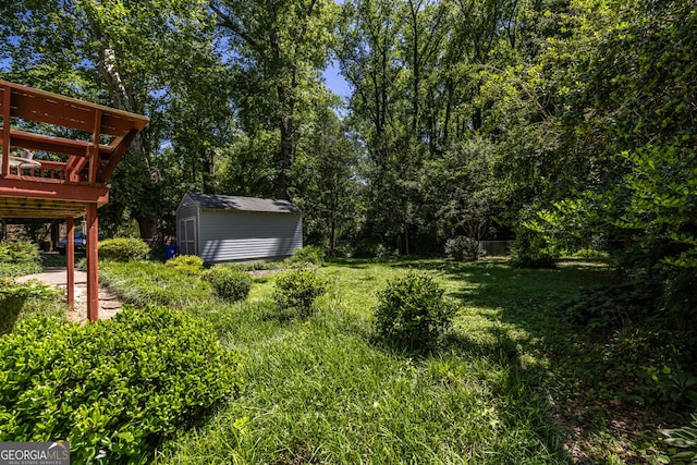 1268 Thomas Rd, Decatur, GA 30030 - view of grassy yard featuring a wooden deck