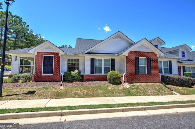150 Old Mill Rd Unit 331, Cartersville, GA 30120 - view of front of house featuring brick siding and roof with shingles
