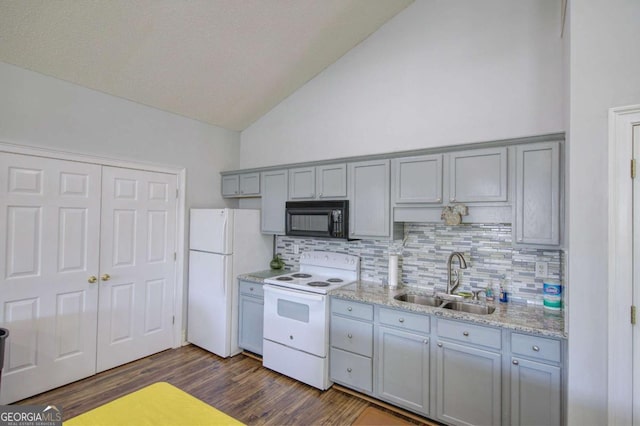 150 Old Mill Rd Unit 331, Cartersville, GA 30120 - kitchen with white appliances, a sink, gray cabinetry, vaulted ceiling, and tasteful backsplash