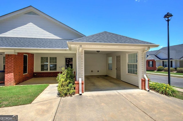 150 Old Mill Rd Unit 331, Cartersville, GA 30120 - single story home featuring driveway, brick siding, an attached carport, and roof with shingles