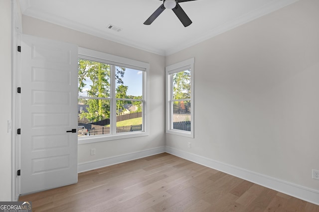 2631 Sardis Way, Buford, GA 30519 - empty room with wood finished floors, crown molding, baseboards, and a ceiling fan