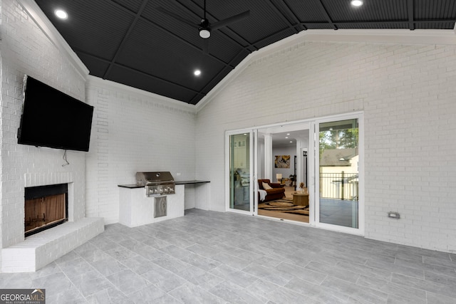 2631 Sardis Way, Buford, GA 30519 - view of patio / terrace featuring ceiling fan and an outdoor brick fireplace