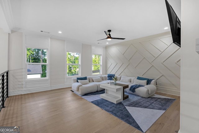 2631 Sardis Way, Buford, GA 30519 - living room featuring a decorative wall, ceiling fan, and wood finished floors