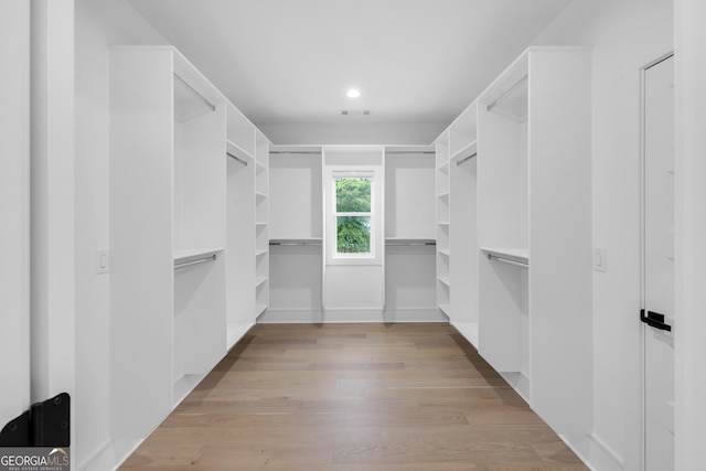 2631 Sardis Way, Buford, GA 30519 - walk in closet with light wood finished floors