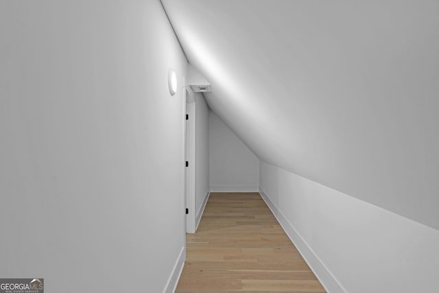 2631 Sardis Way, Buford, GA 30519 - corridor featuring lofted ceiling, light wood-style flooring, and baseboards