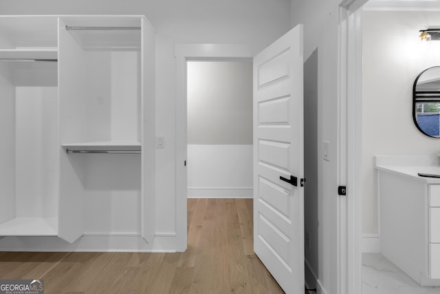 2631 Sardis Way, Buford, GA 30519 - hallway featuring baseboards and light wood-style floors