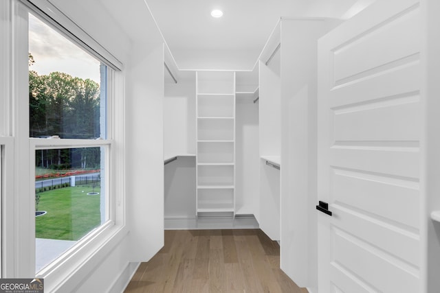 2631 Sardis Way, Buford, GA 30519 - spacious closet featuring wood finished floors