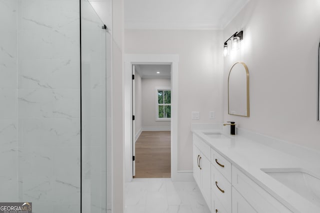 2631 Sardis Way, Buford, GA 30519 - bathroom featuring double vanity, marble finish flooring, crown molding, and baseboards