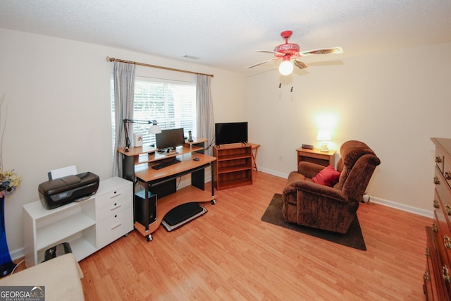 2191 Rockbridge Rd Unit 103, Stone Mountain, GA 30087 - office with a ceiling fan, light wood-style floors, and baseboards