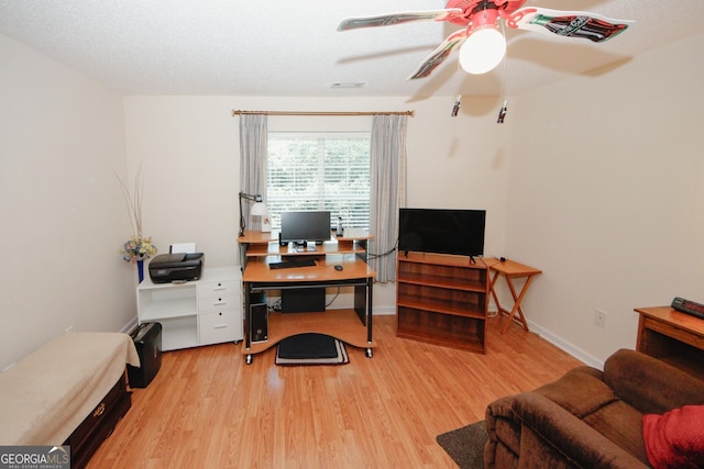 2191 Rockbridge Rd Unit 103, Stone Mountain, GA 30087 - office featuring light wood-style flooring, a ceiling fan, and baseboards