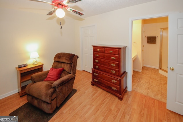 2191 Rockbridge Rd Unit 103, Stone Mountain, GA 30087 - sitting room with a ceiling fan, light wood-style flooring, and baseboards