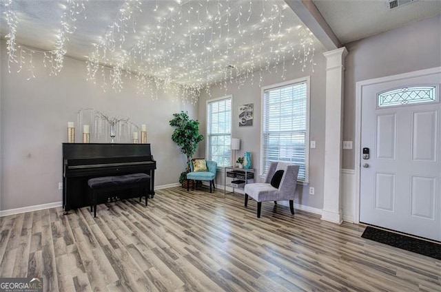 2908 Cottesford Way, Smyrna, GA 30080 - foyer featuring wood finished floors, baseboards, and decorative columns