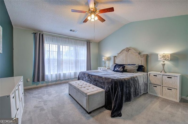 2908 Cottesford Way, Smyrna, GA 30080 - bedroom featuring light carpet, vaulted ceiling, baseboards, a textured ceiling, and ceiling fan