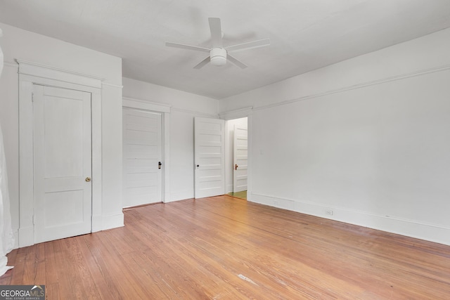 1157 Alta Ave NE, Atlanta, GA 30307 - unfurnished bedroom with light wood-type flooring, a ceiling fan, and baseboards