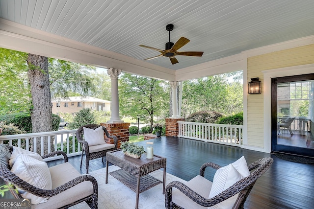 1157 Alta Ave NE, Atlanta, GA 30307 - covered porch with a ceiling fan and an outdoor hangout area