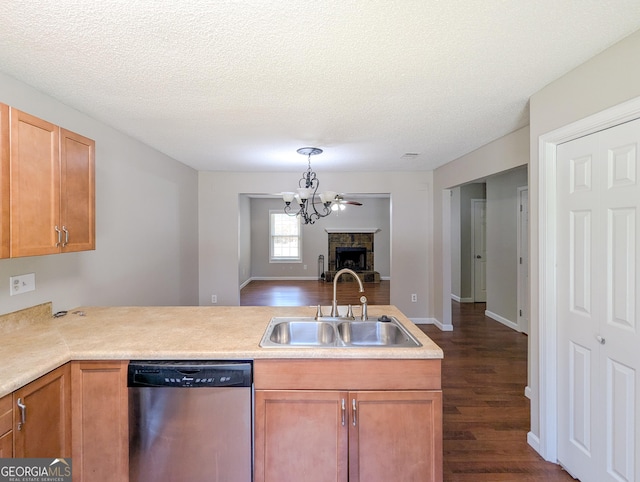 2918 Pavia Cir, Austell, GA 30106 - kitchen with dishwasher, a sink, a chandelier, dark wood-type flooring, and open floor plan