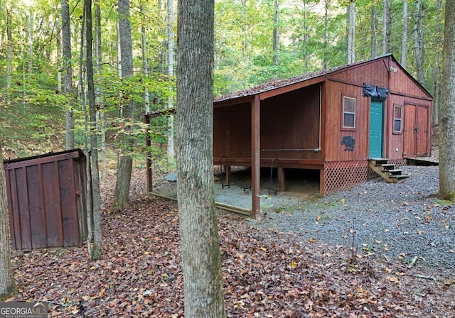 151 Hatchet Trl, Cherry Log, GA 30522 - view of outdoor structure with entry steps and a view of trees