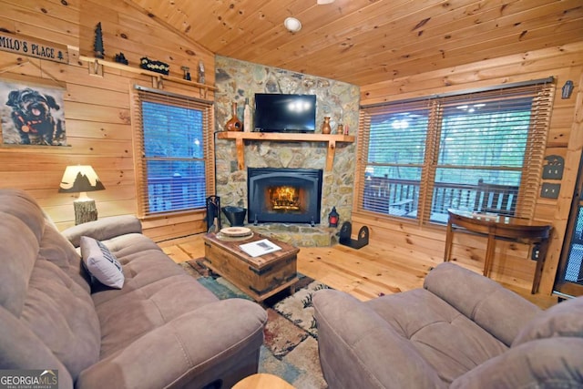 151 Hatchet Trl, Cherry Log, GA 30522 - living area with lofted ceiling, wood walls, a fireplace, hardwood / wood-style flooring, and wood ceiling
