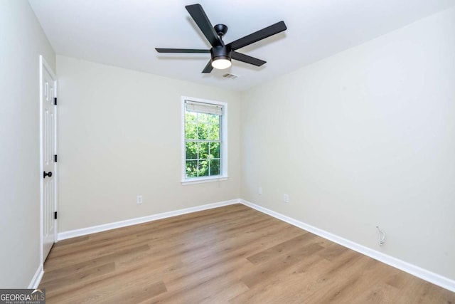 2915 Commonwealth Cir, Alpharetta, GA 30004 - unfurnished room with light wood finished floors, baseboards, and a ceiling fan