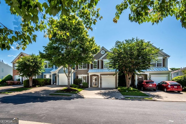 2915 Commonwealth Cir, Alpharetta, GA 30004 - view of front of house with a garage, driveway, and stucco siding