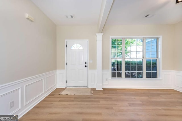 2915 Commonwealth Cir, Alpharetta, GA 30004 - entryway with a decorative wall, wainscoting, and light wood-style flooring