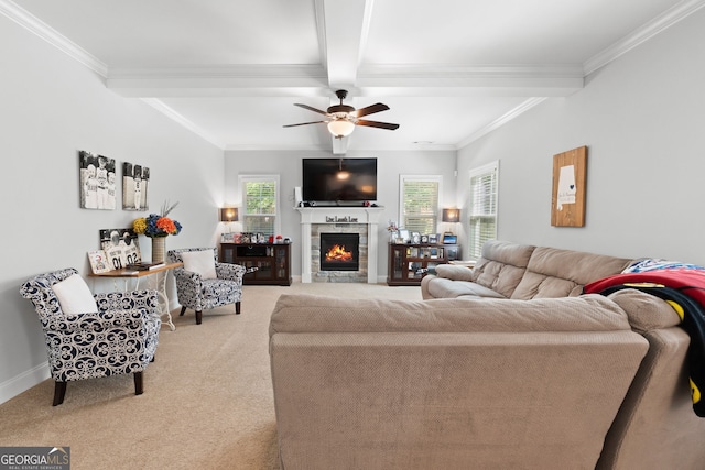 130 Edgewater Trl, Fayetteville, GA 30215 - living area with carpet, ornamental molding, ceiling fan, beamed ceiling, and a lit fireplace