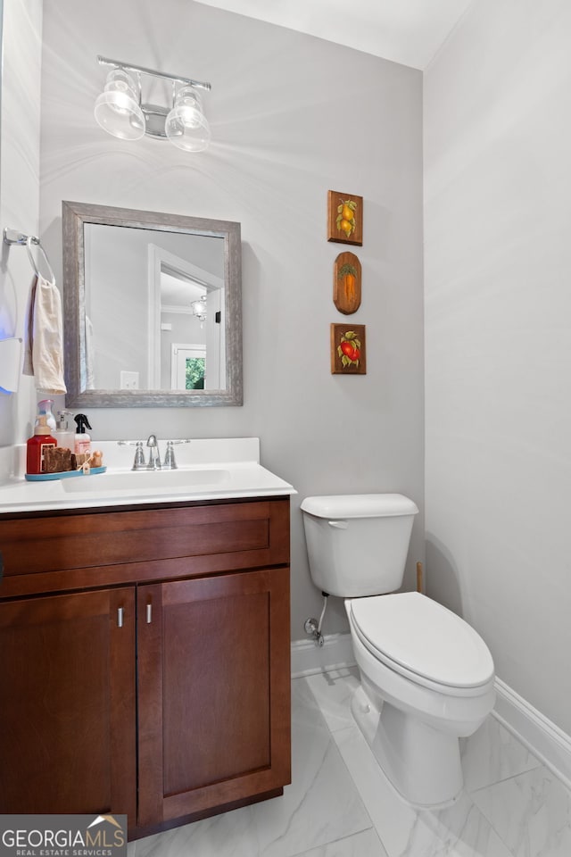 130 Edgewater Trl, Fayetteville, GA 30215 - bathroom with vanity, toilet, baseboards, and marble look tiles