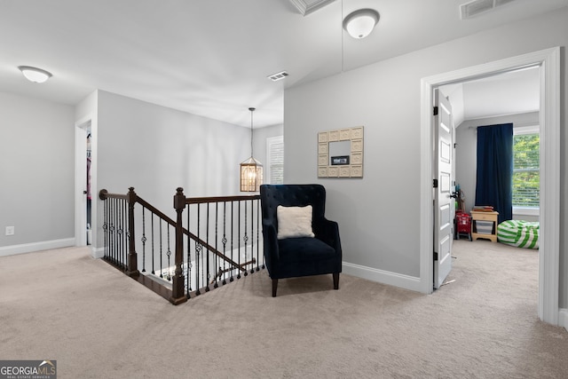 130 Edgewater Trl, Fayetteville, GA 30215 - sitting room featuring attic access, carpet flooring, baseboards, and an upstairs landing
