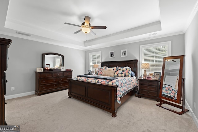 130 Edgewater Trl, Fayetteville, GA 30215 - bedroom featuring a tray ceiling, crown molding, light colored carpet, baseboards, and a ceiling fan