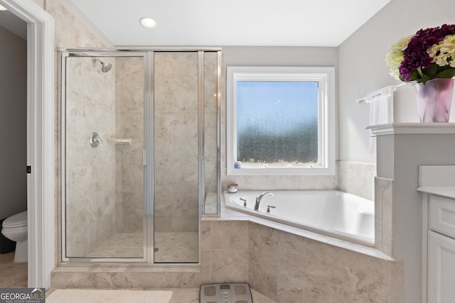 130 Edgewater Trl, Fayetteville, GA 30215 - bathroom with a shower stall, a garden tub, and toilet