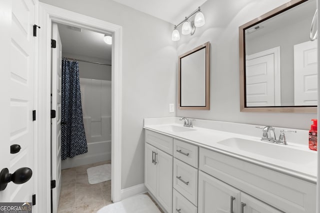 130 Edgewater Trl, Fayetteville, GA 30215 - bathroom with double vanity and shower / bath combo with shower curtain