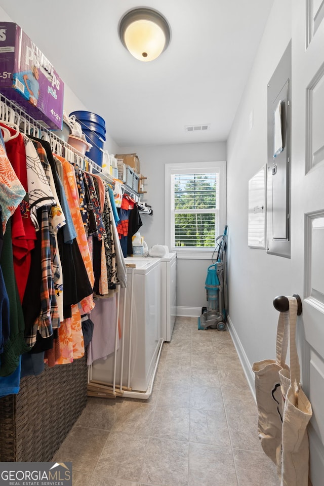 130 Edgewater Trl, Fayetteville, GA 30215 - laundry room with independent washer and dryer, baseboards, and tile patterned flooring