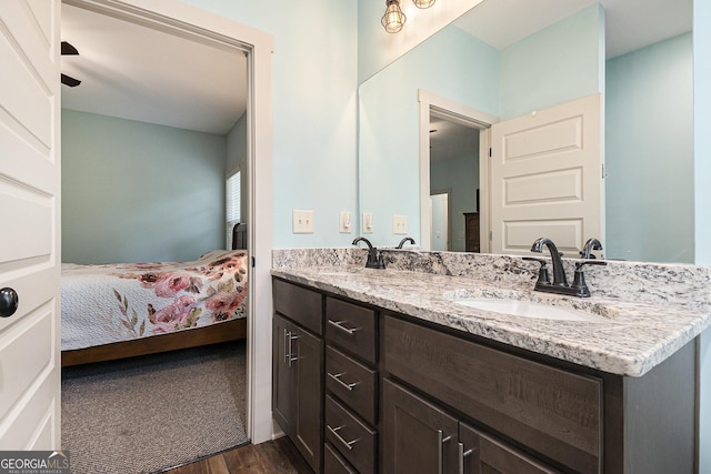 562 Yonah Lake Dr, Sautee Nacoochee, GA 30571 - ensuite bathroom featuring double vanity and wood finished floors