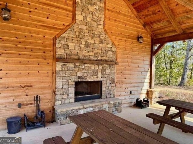 562 Yonah Lake Dr, Sautee Nacoochee, GA 30571 - view of patio / terrace with an outdoor stone fireplace