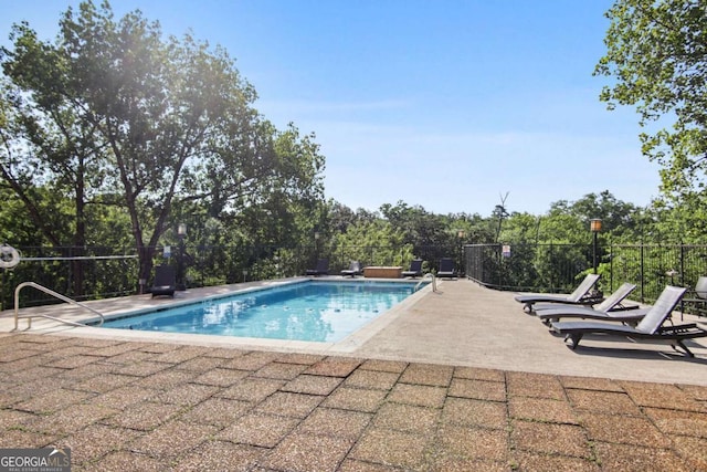2285 Peachtree Rd NE, Atlanta, GA 30309 - community pool featuring a patio area