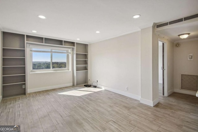 2285 Peachtree Rd NE, Atlanta, GA 30309 - unfurnished living room featuring crown molding, baseboards, wood finished floors, and recessed lighting