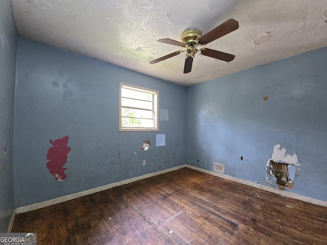 4274 Kimball Rd SW, Atlanta, GA 30331 - spare room featuring hardwood / wood-style flooring, ceiling fan, a textured ceiling, and baseboards