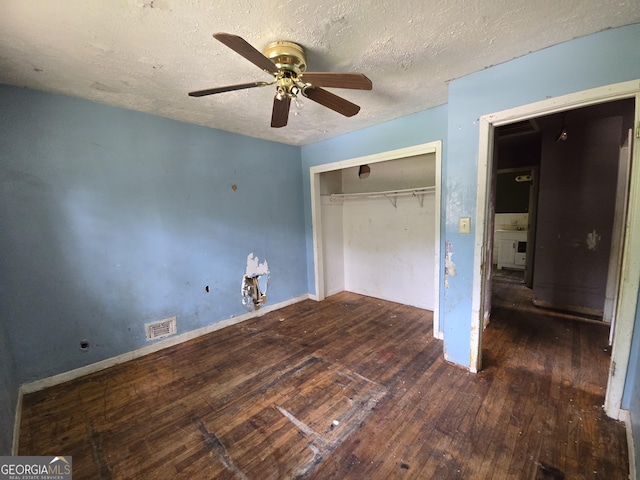 4274 Kimball Rd SW, Atlanta, GA 30331 - unfurnished bedroom with hardwood / wood-style floors, a closet, a textured ceiling, baseboards, and a ceiling fan
