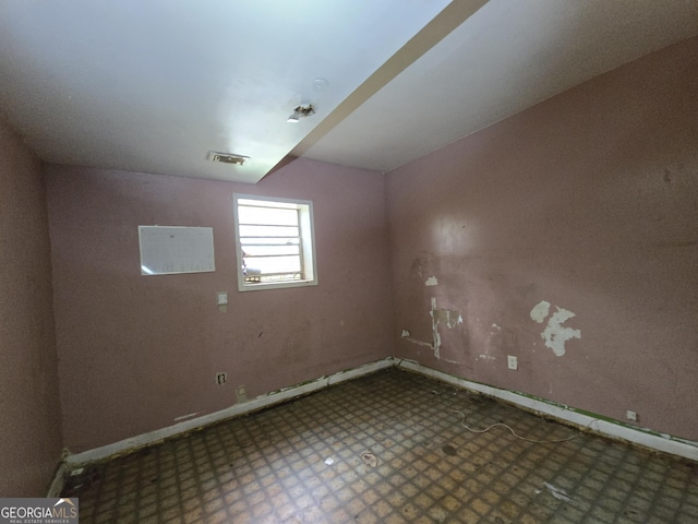 4274 Kimball Rd SW, Atlanta, GA 30331 - empty room featuring tile patterned floors and baseboards