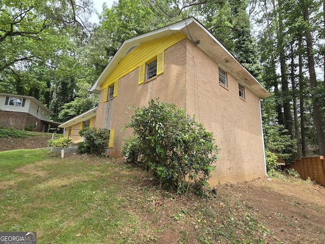 4274 Kimball Rd SW, Atlanta, GA 30331 - view of side of property featuring brick siding and view of wooded area