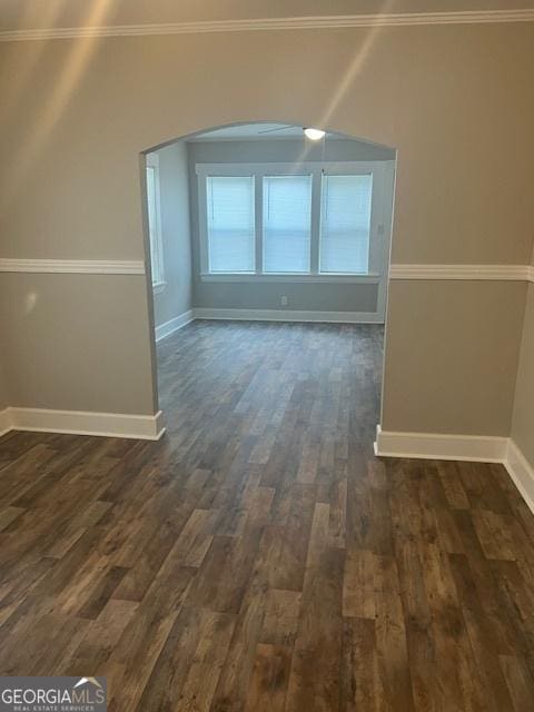 313 Rothwell St, Pooler, GA 31322 - bonus room with dark wood-type flooring, arched walkways, and baseboards