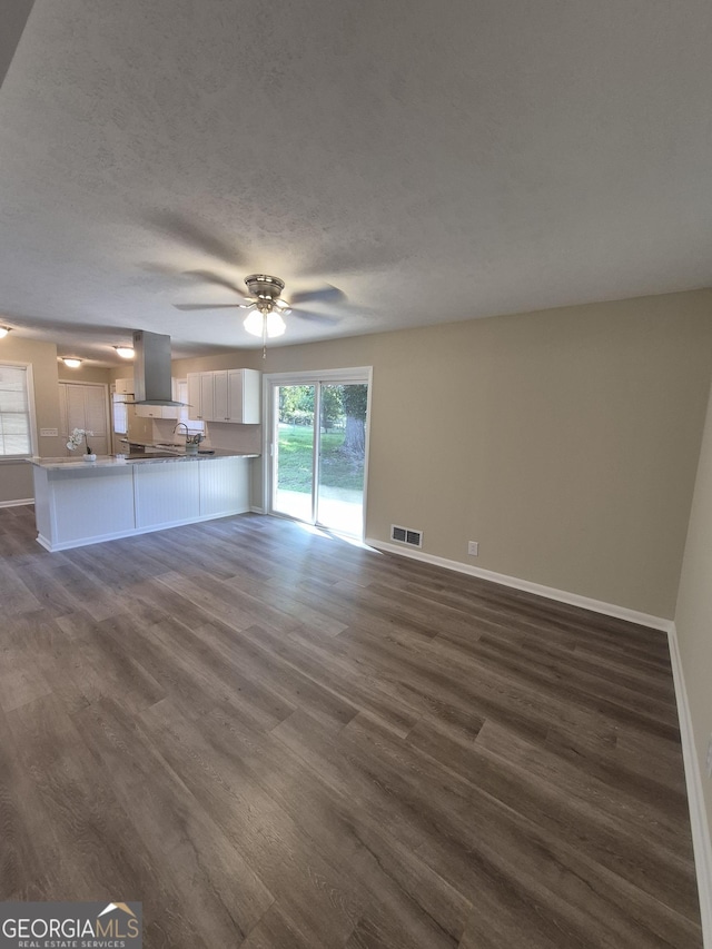 116 Cherokee Rdg, Athens, GA 30606 - unfurnished living room with dark wood-style flooring and ceiling fan