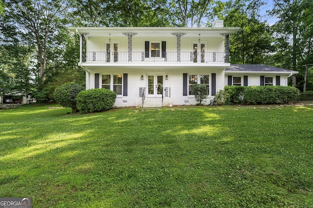 5290 River Mill Cir, Marietta, GA 30068 - rear view of house featuring french doors, a balcony, a lawn, and brick siding