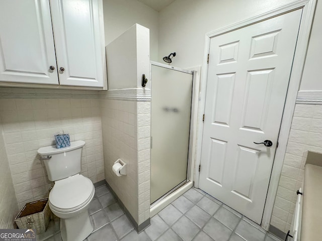 134 Roy Dean Rd, Buchanan, GA 30113 - full bathroom with tile walls, a shower stall, tile patterned floors, and toilet
