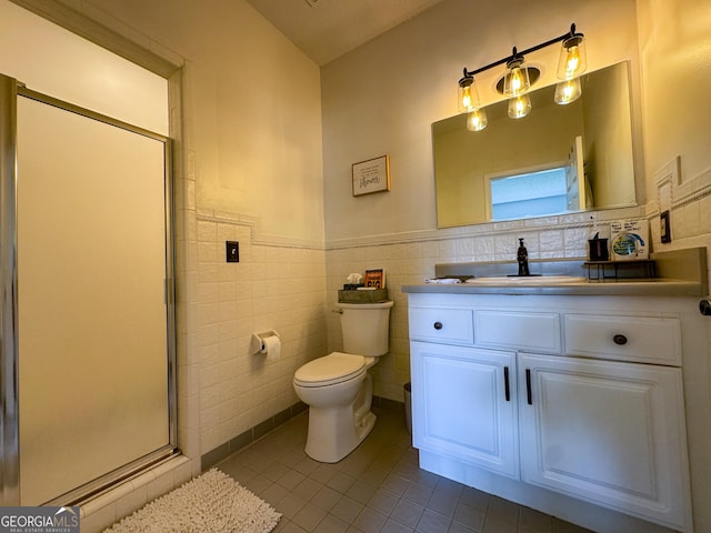 134 Roy Dean Rd, Buchanan, GA 30113 - bathroom with tile patterned flooring, toilet, a stall shower, tile walls, and vanity