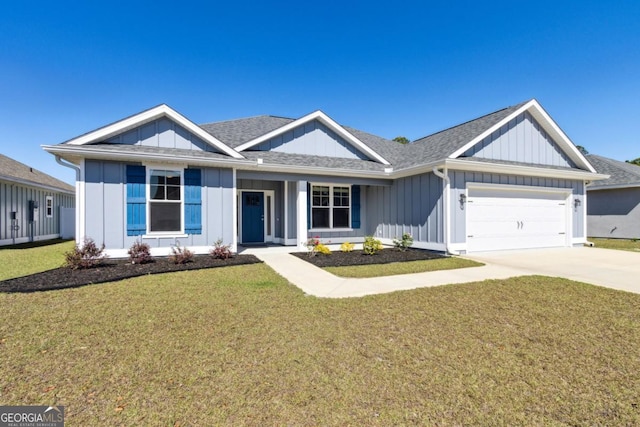 194 Pistachio Ln, Kingsland, GA 31548 - ranch-style home featuring board and batten siding, an attached garage, a front lawn, and concrete driveway