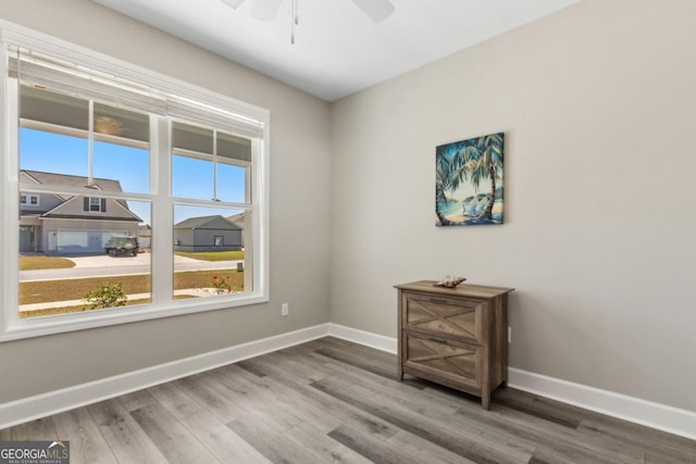 194 Pistachio Ln, Kingsland, GA 31548 - empty room featuring baseboards, ceiling fan, and wood finished floors